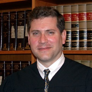 Mark V. Holmes